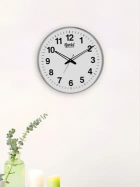 🔥 AJANTA White and Black Analog Fashion Wall Clock